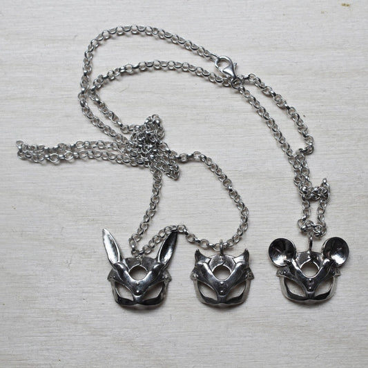 Petit Pendentif Masque Coquin
